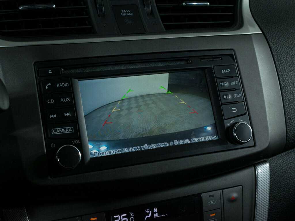 Nissan Tiida с пробегом — 2015 год. Фото: #13