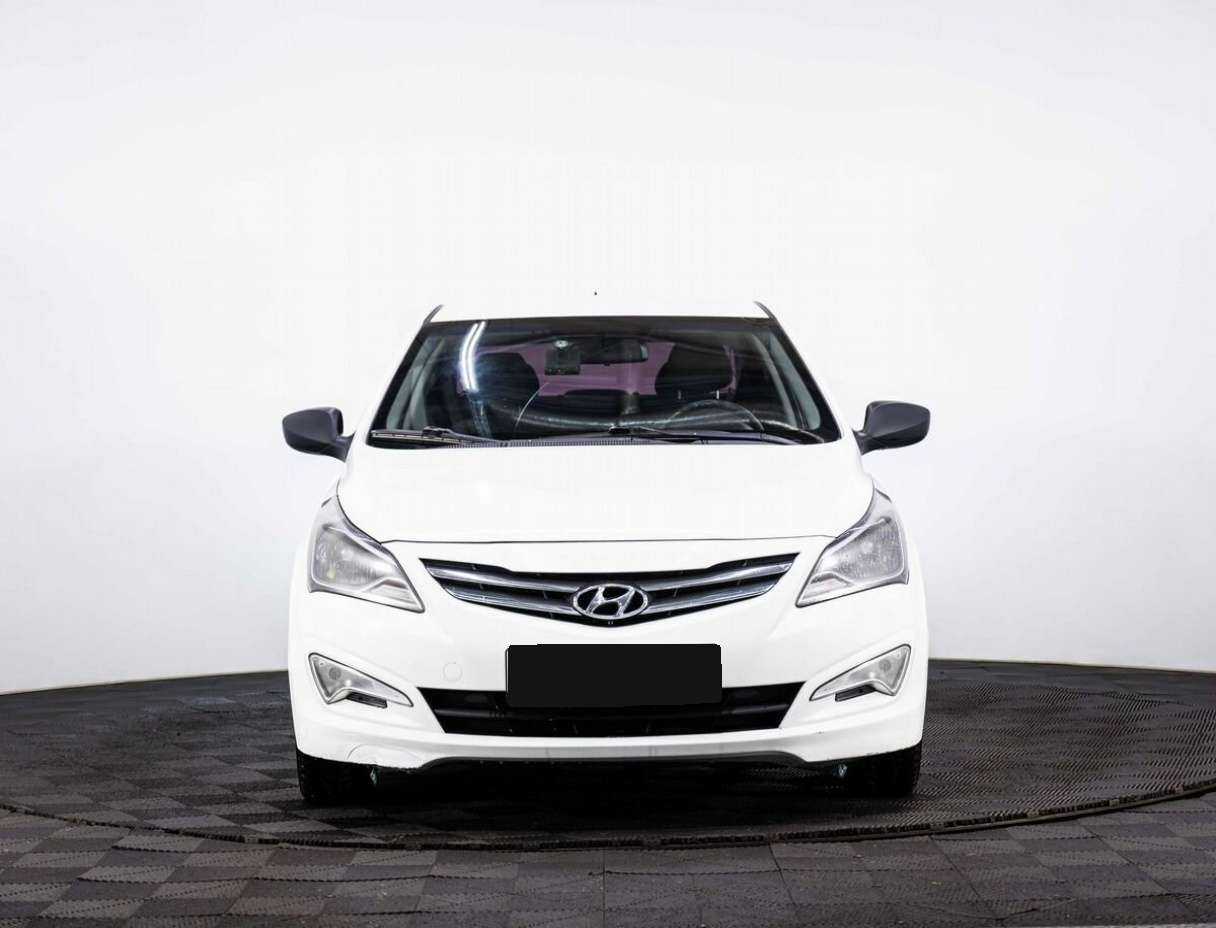 Hyundai Solaris с пробегом — 2014 год. Фото: #1