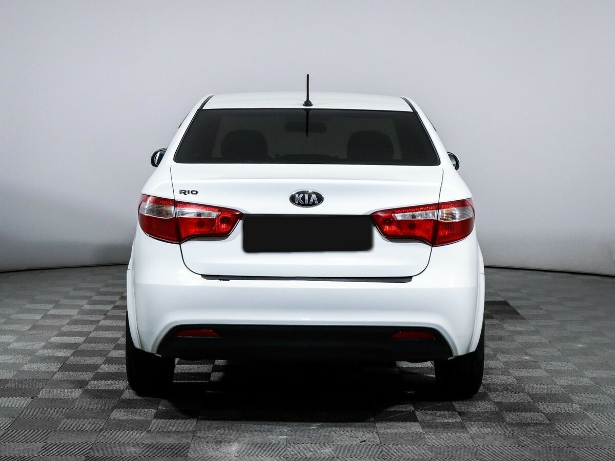 Kia Rio с пробегом — 2013 год. Фото: #4