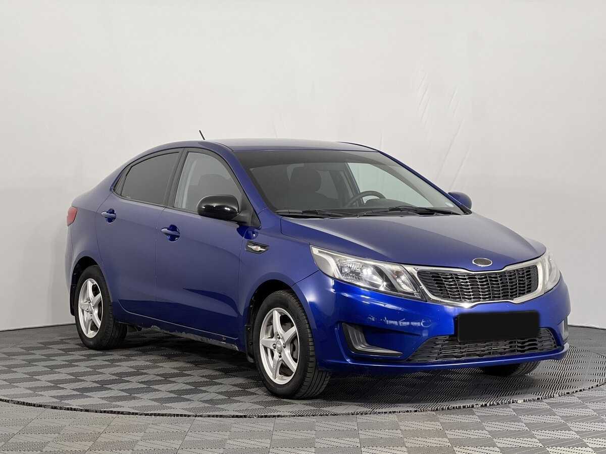 Kia Rio с пробегом — 2013 год. Фото: #2