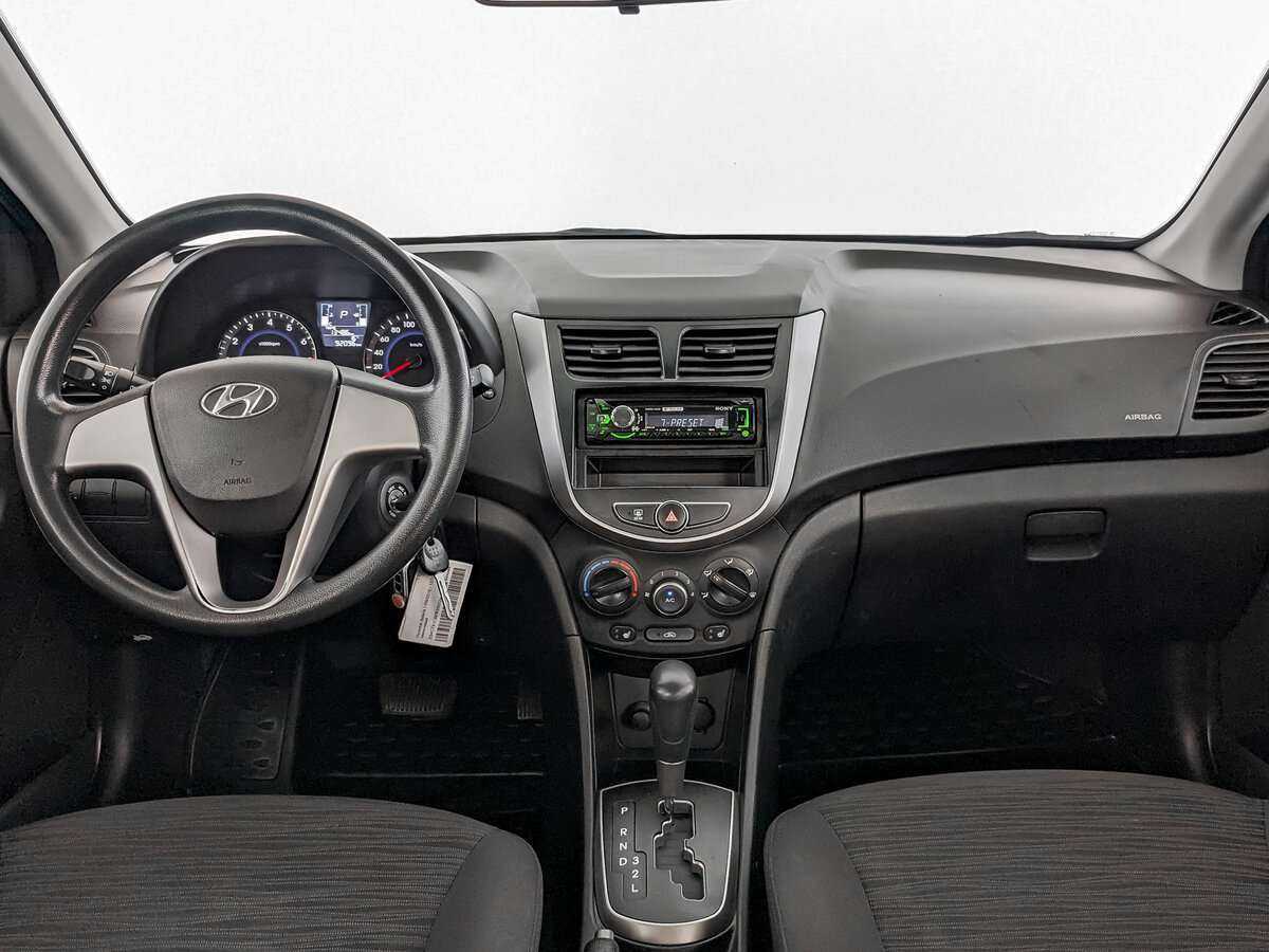 Hyundai Solaris с пробегом — 2014 год. Фото: #11