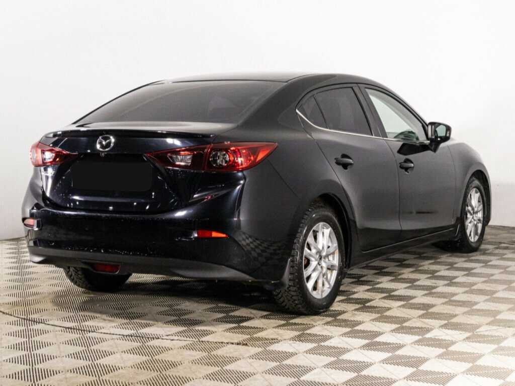 Mazda 3 с пробегом — 2013 год. Фото: #4