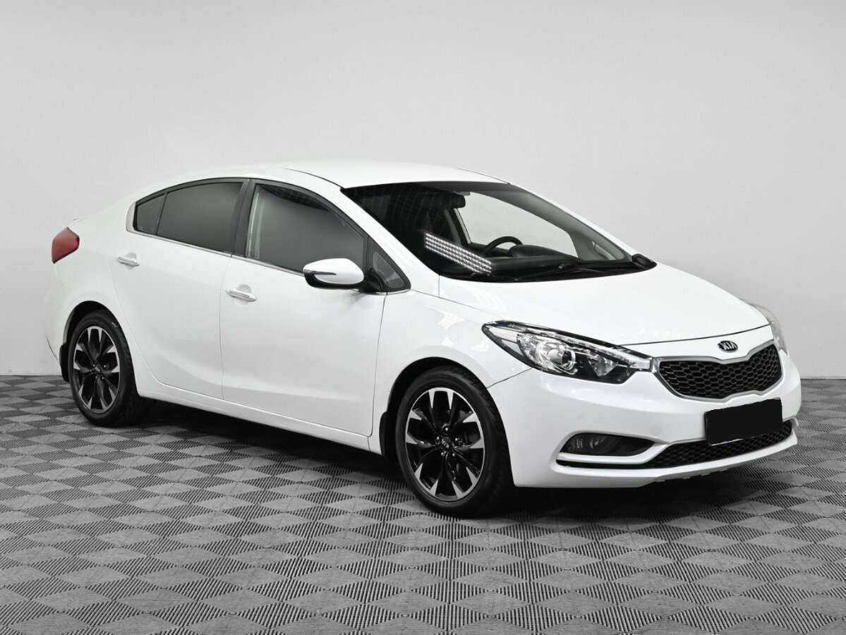 Kia Cerato с пробегом — 2015 год. Фото: #2