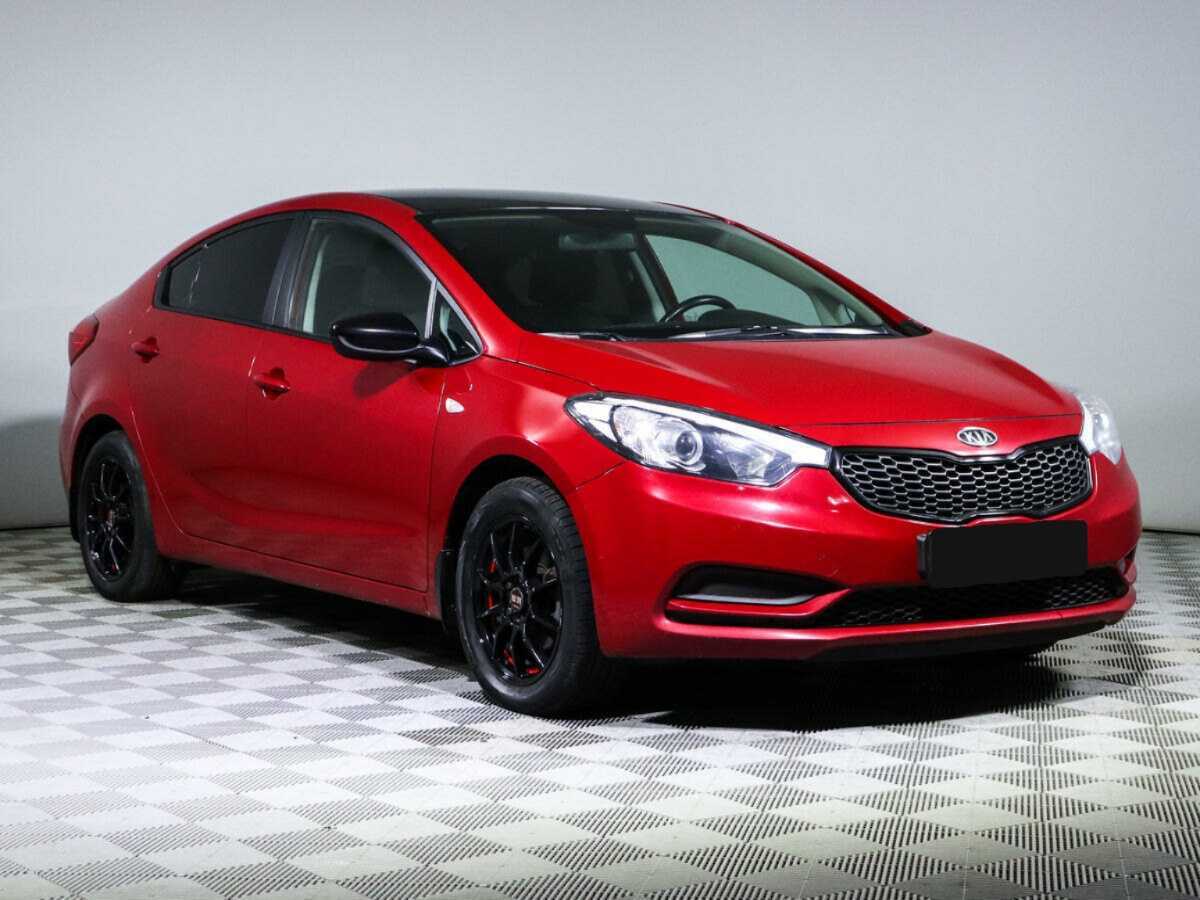 Kia Cerato с пробегом — 2014 год. Фото: #2