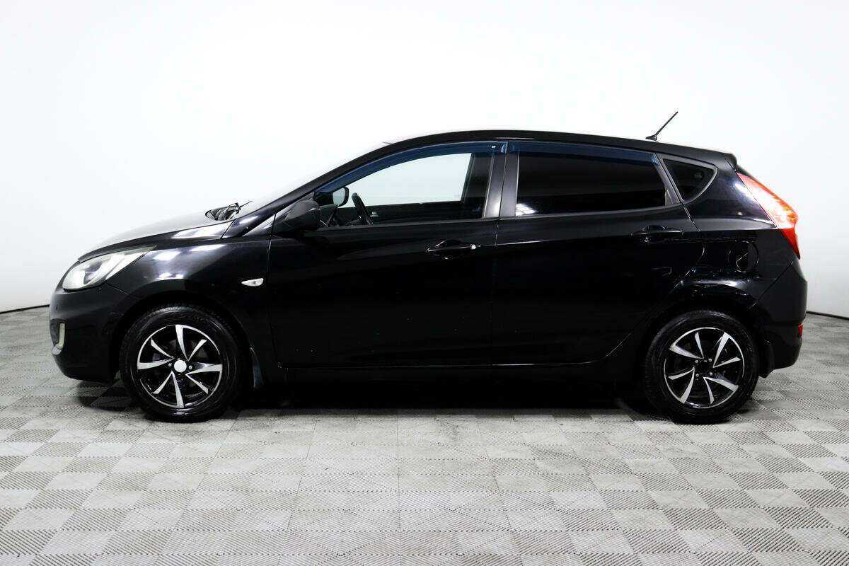 Hyundai Solaris с пробегом — 2012 год. Фото: #7