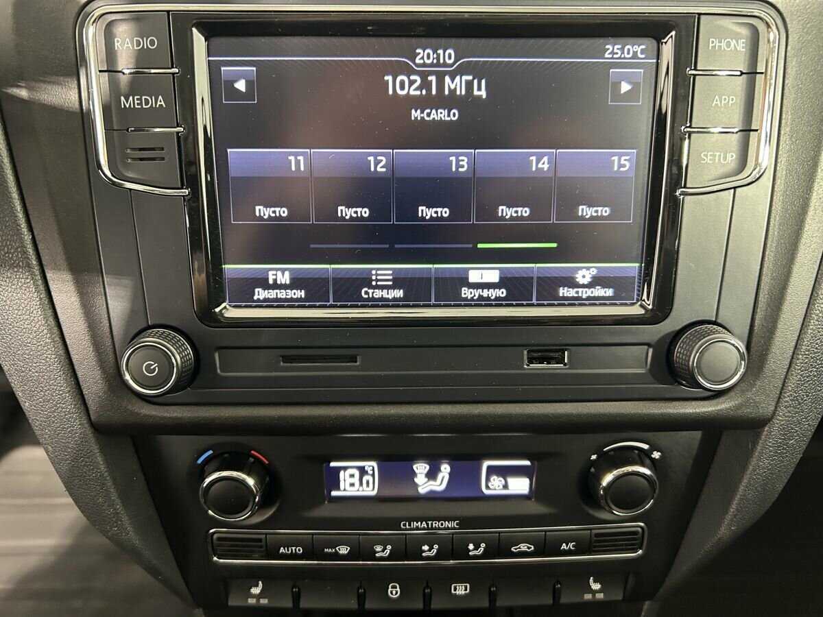 Skoda Rapid с пробегом — 2014 год. Фото: #11