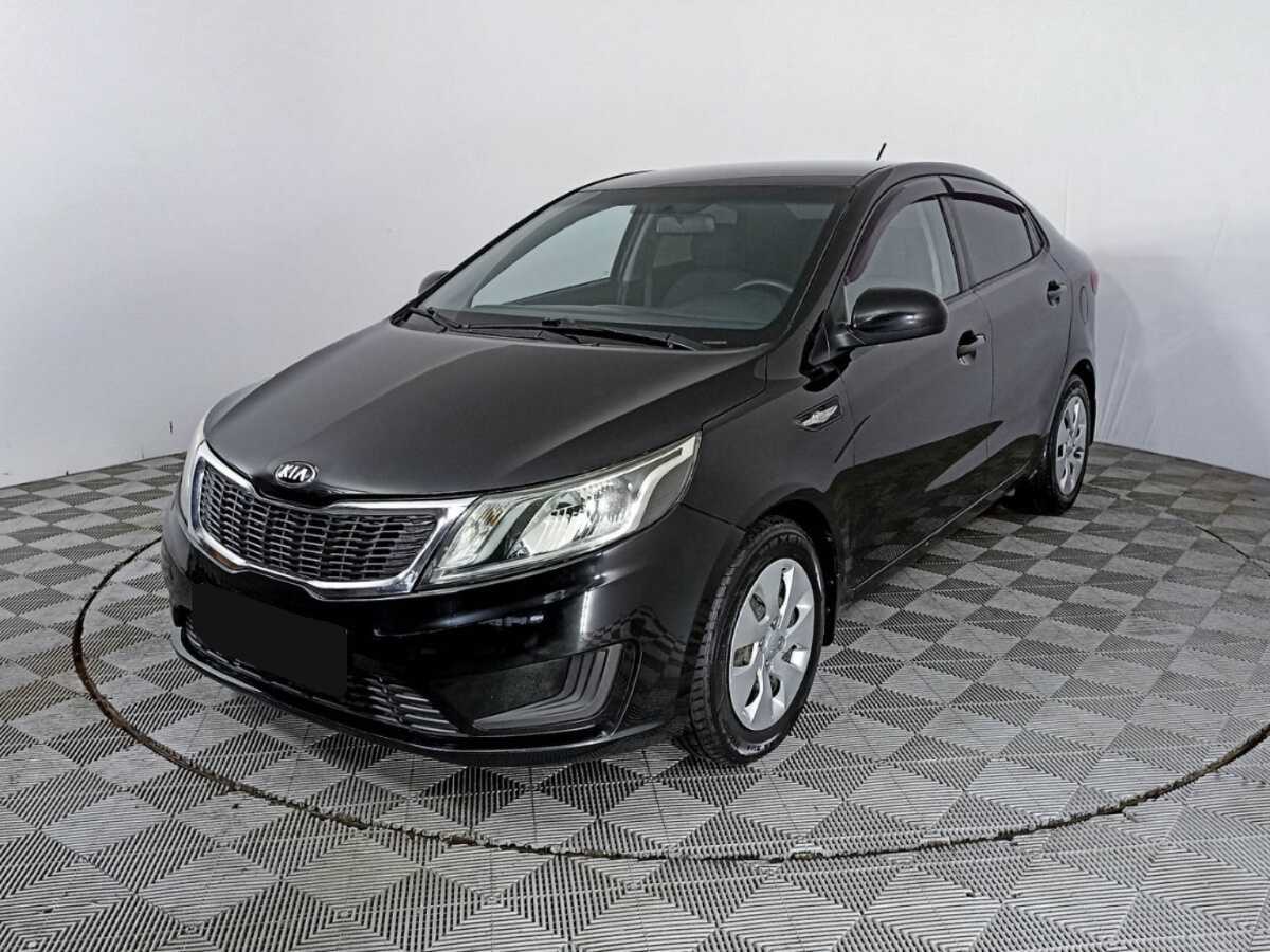 Kia Rio с пробегом — 2014 год. Фото: #0