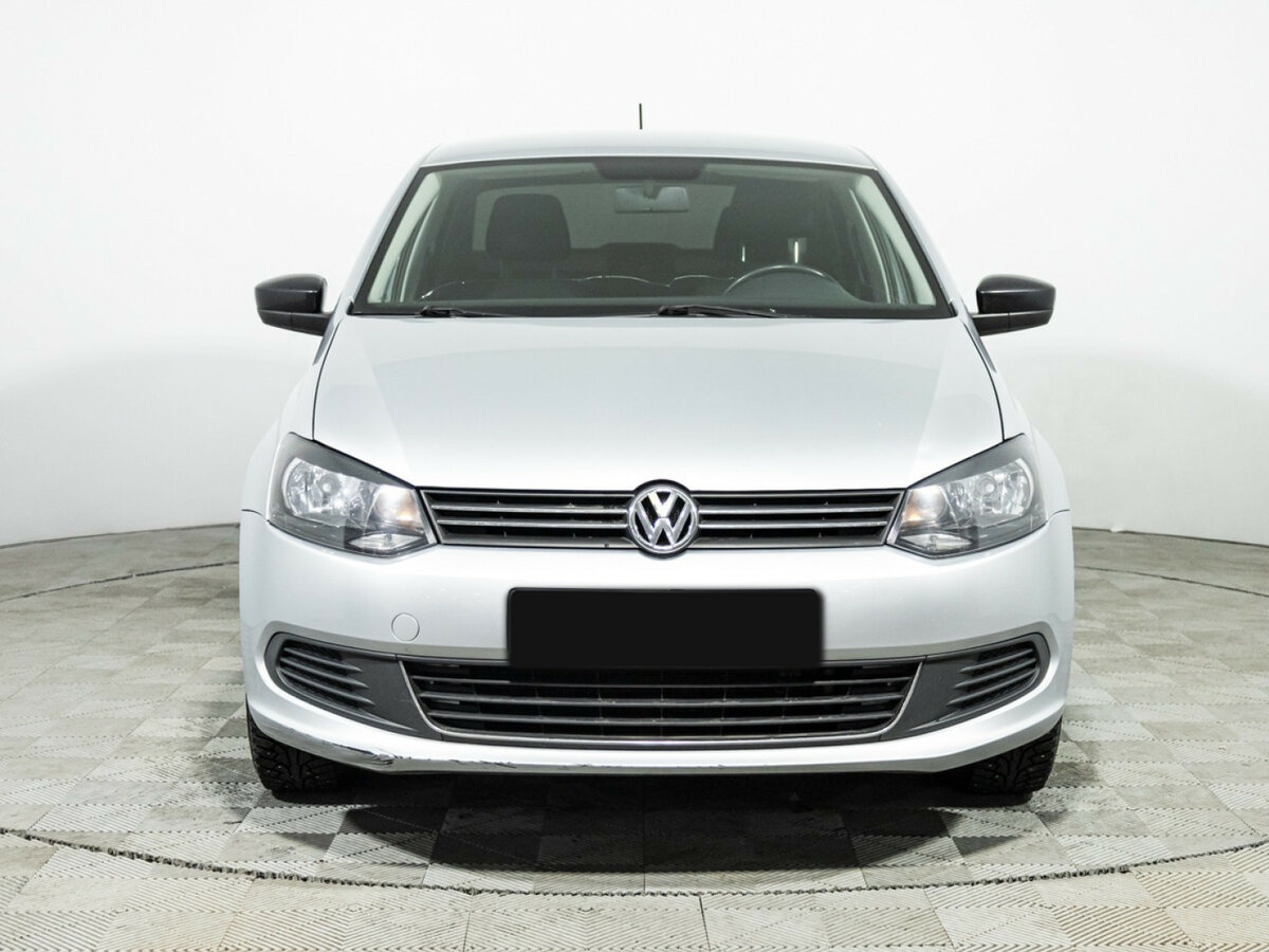 Volkswagen Polo с пробегом — 2013 год. Фото: #1