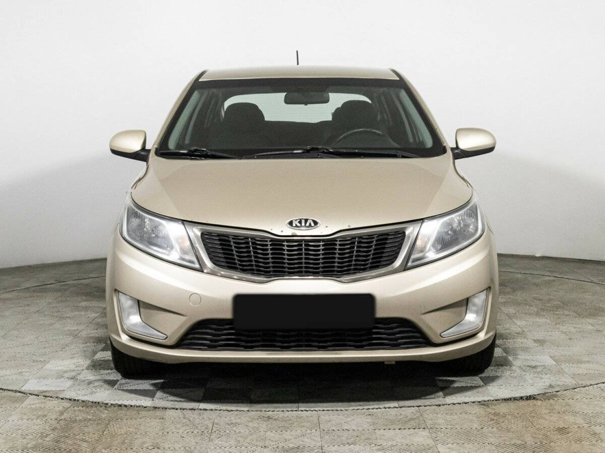 Kia Rio с пробегом — 2014 год. Фото: #1