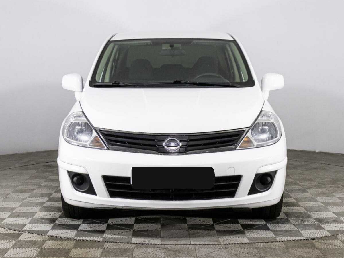 Nissan Tiida с пробегом — 2013 год. Фото: #1