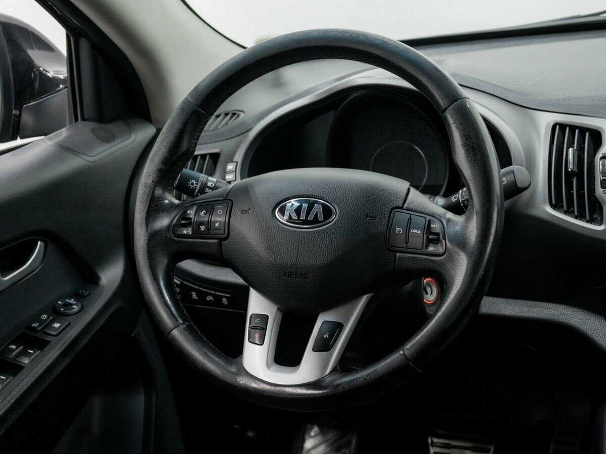 Kia Sportage с пробегом — 2012 год. Фото: #11