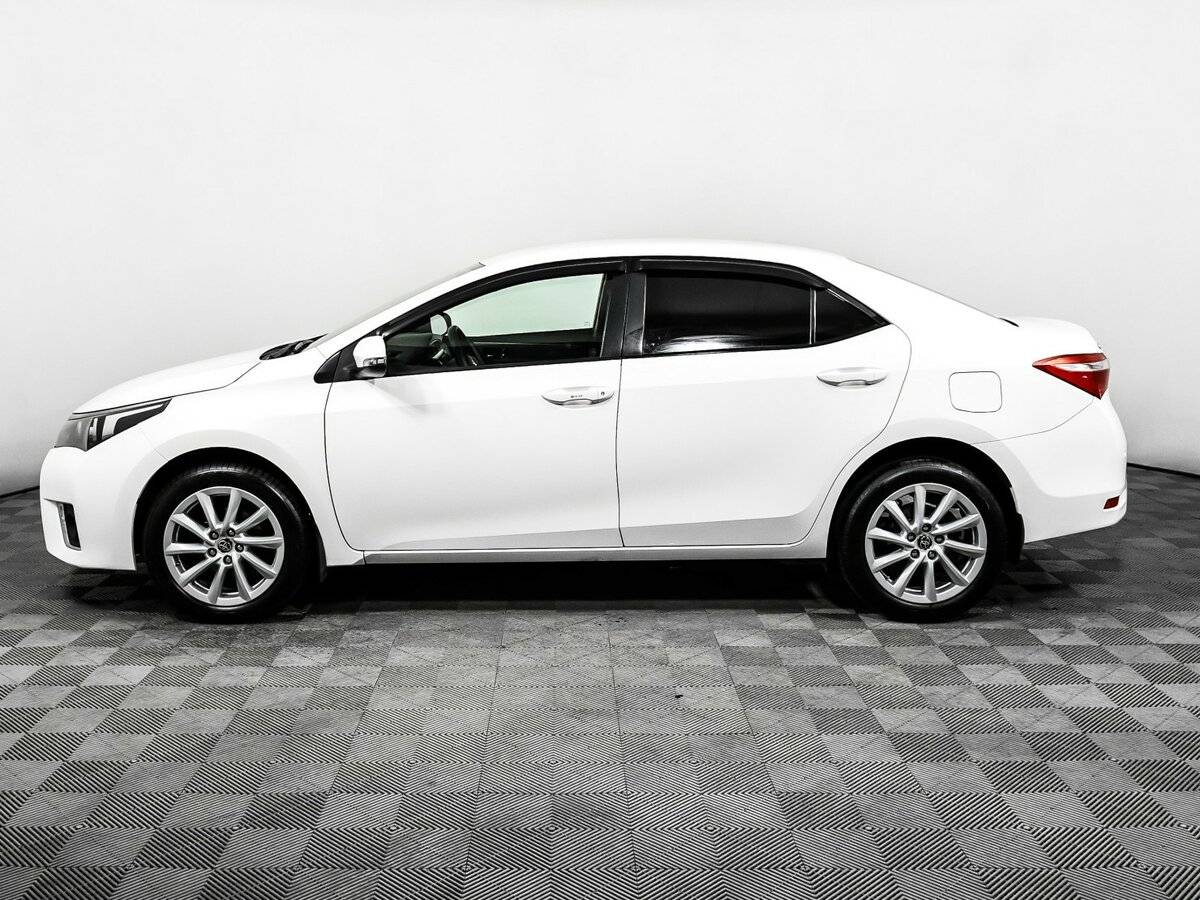 Toyota Corolla с пробегом — 2013 год. Фото: #7