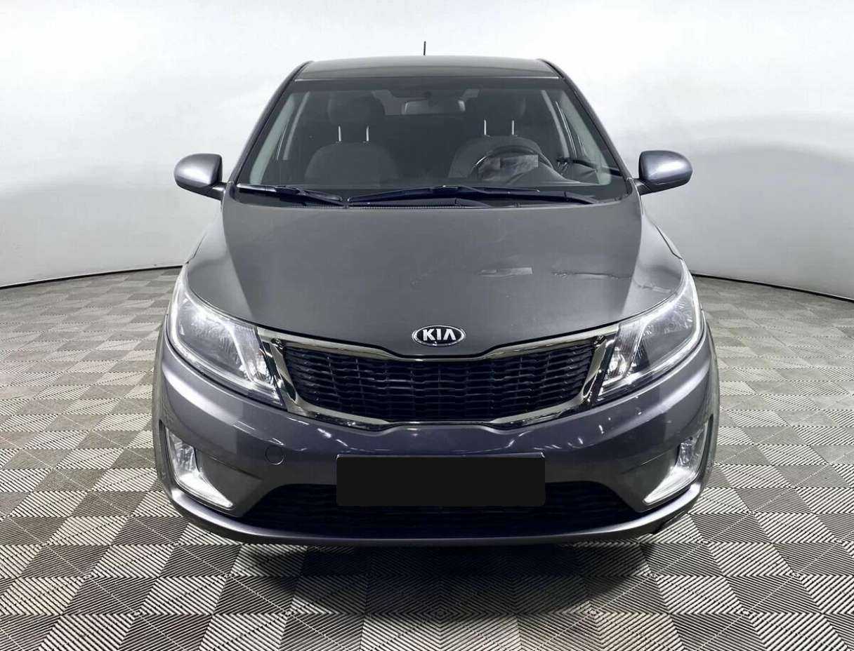 Kia Rio с пробегом — 2013 год. Фото: #1