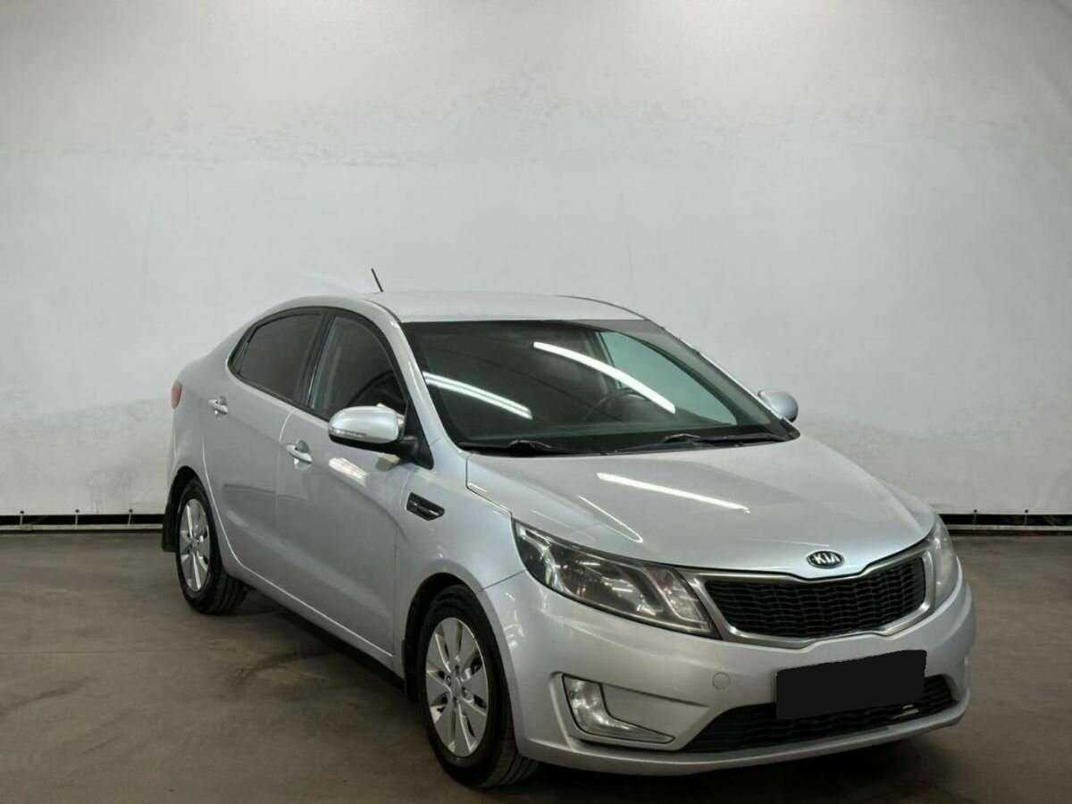 Kia Rio с пробегом — 2014 год. Фото: #2