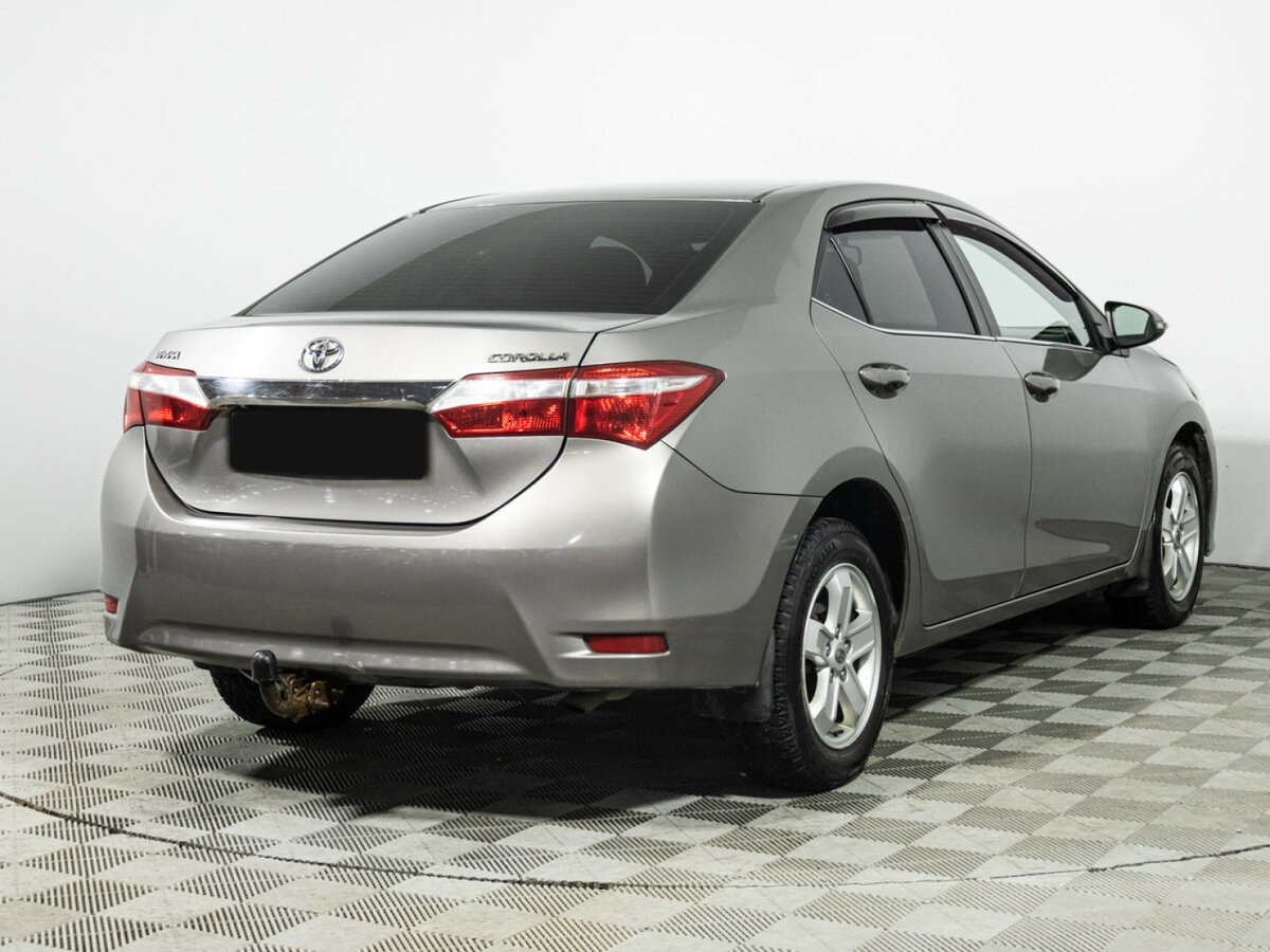 Toyota Corolla с пробегом — 2014 год. Фото: #4