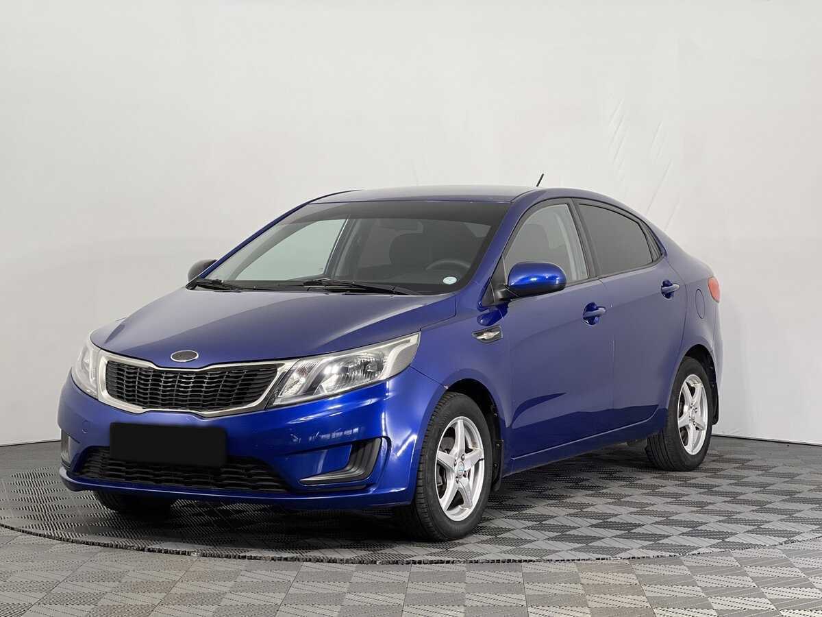 Kia Rio с пробегом — 2013 год. Фото: #0