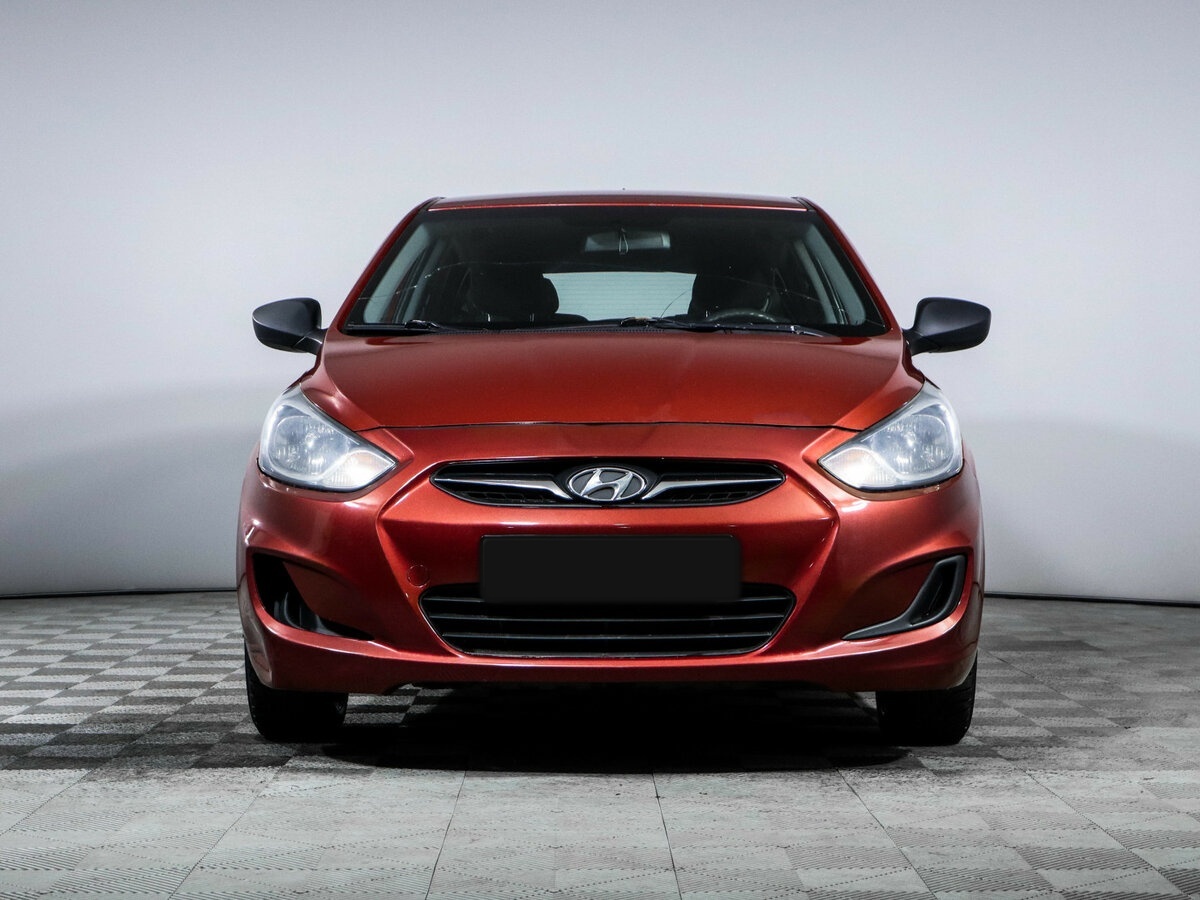 Hyundai Solaris с пробегом — 2013 год. Фото: #1