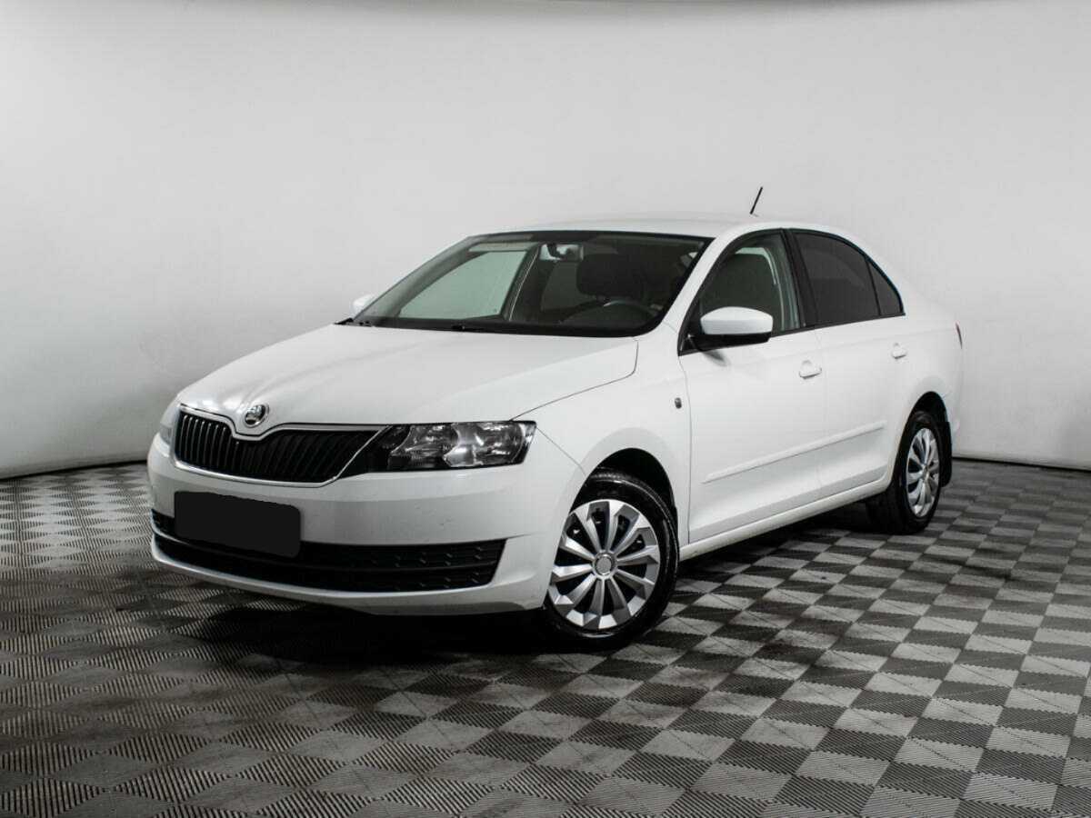 Skoda Rapid с пробегом — 2014 год. Посмотреть фото