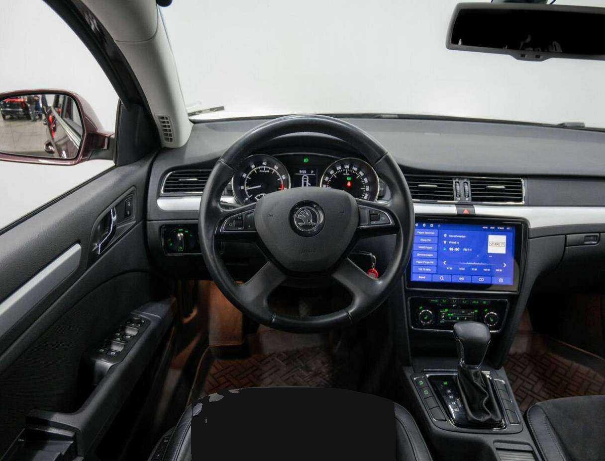 Skoda Superb с пробегом — 2014 год. Фото: #11