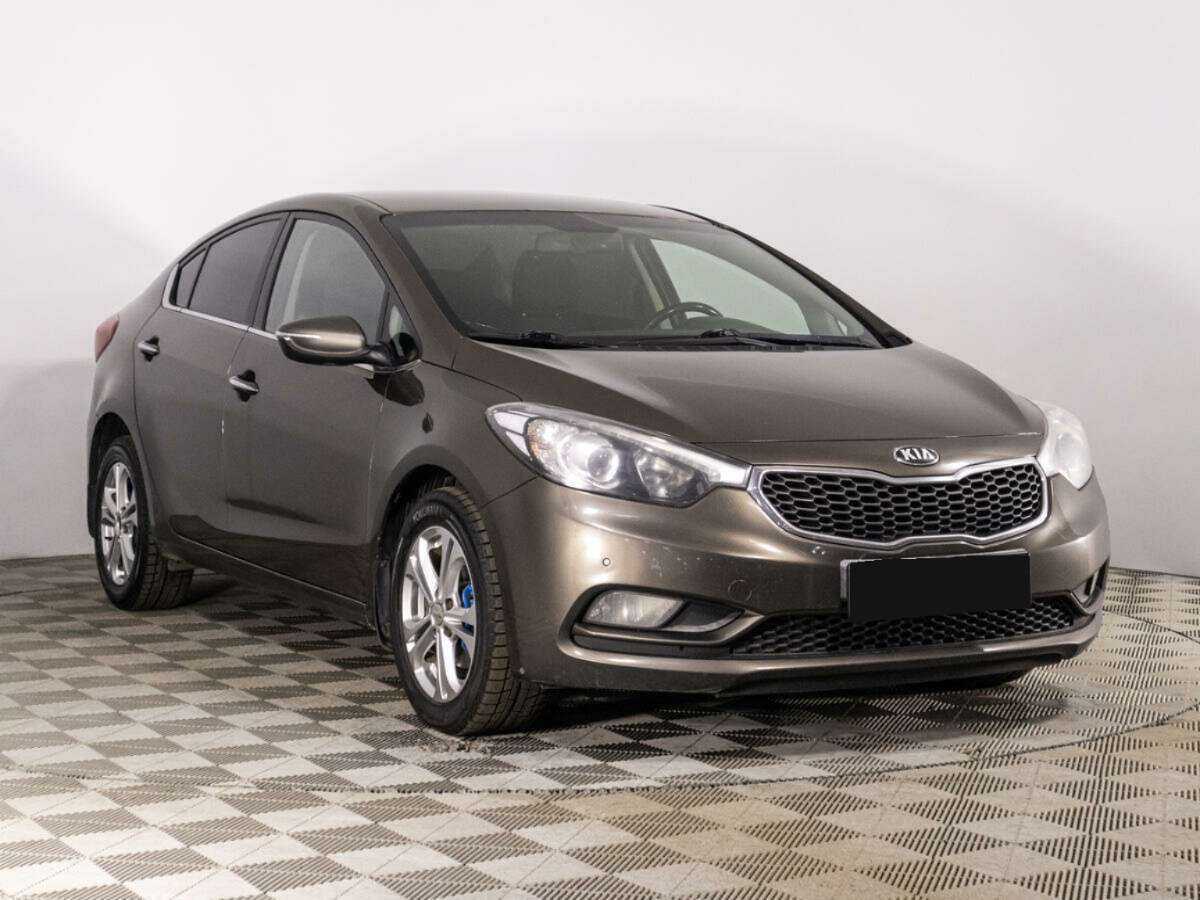 Kia Cerato с пробегом — 2014 год. Фото: #2