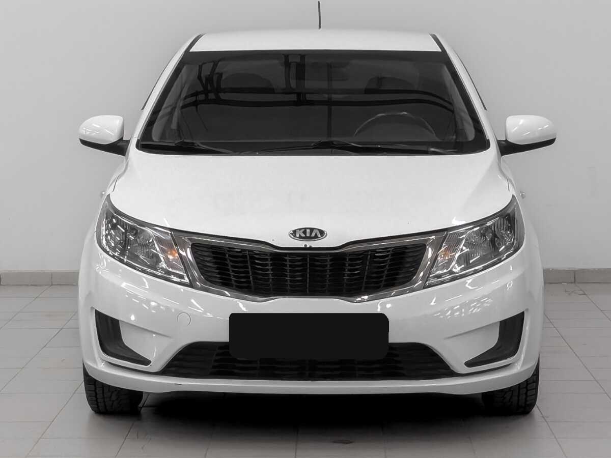 Kia Rio с пробегом — 2015 год. Фото: #1