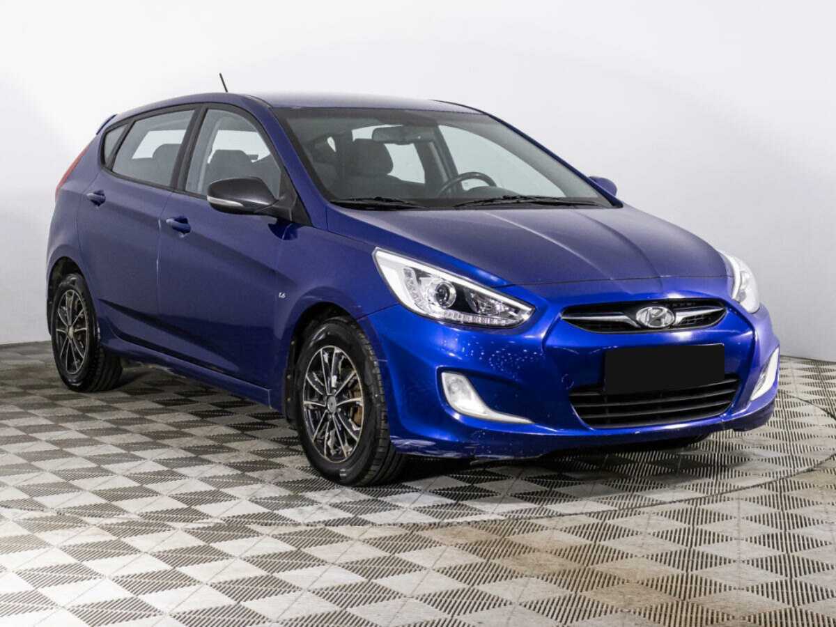 Hyundai Solaris с пробегом — 2013 год. Фото: #2