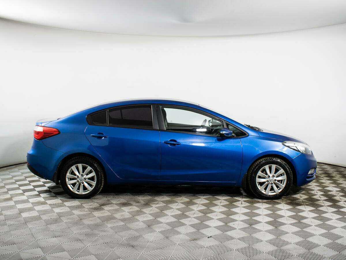 Kia Cerato с пробегом — 2014 год. Фото: #3