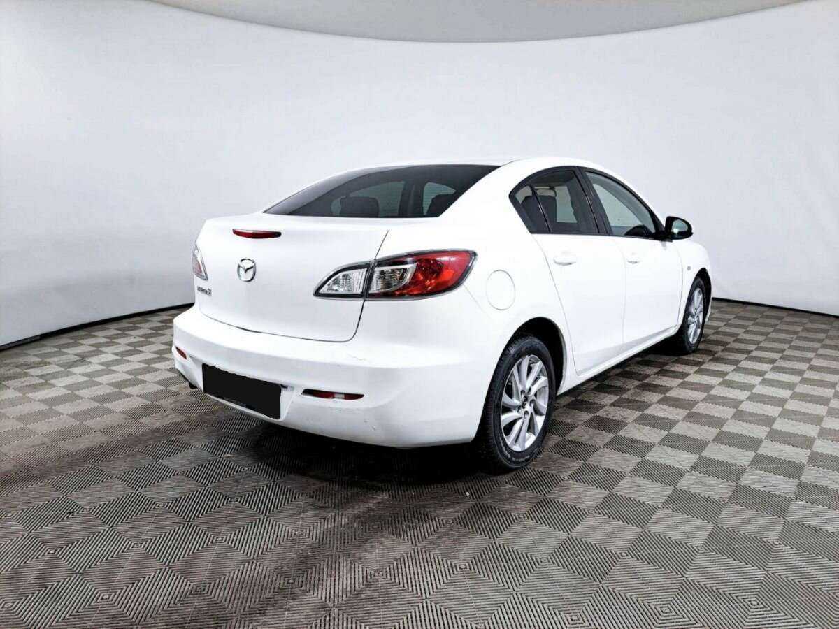 Mazda 3 с пробегом — 2013 год. Фото: #4