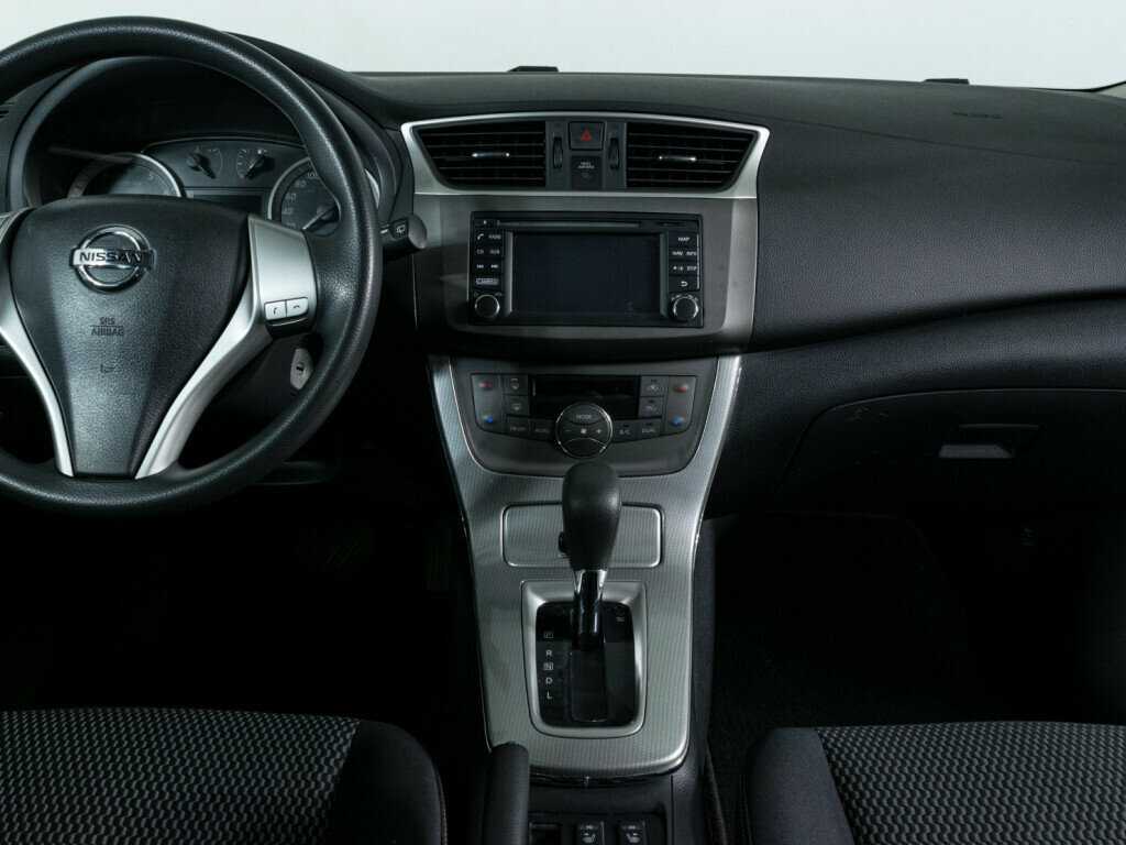 Nissan Tiida с пробегом — 2015 год. Фото: #8