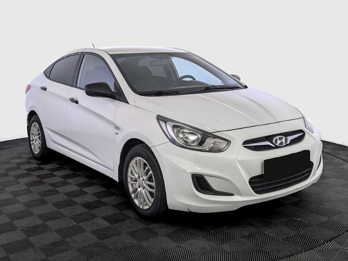 Hyundai Solaris с пробегом — 2014 год. Фото: #2