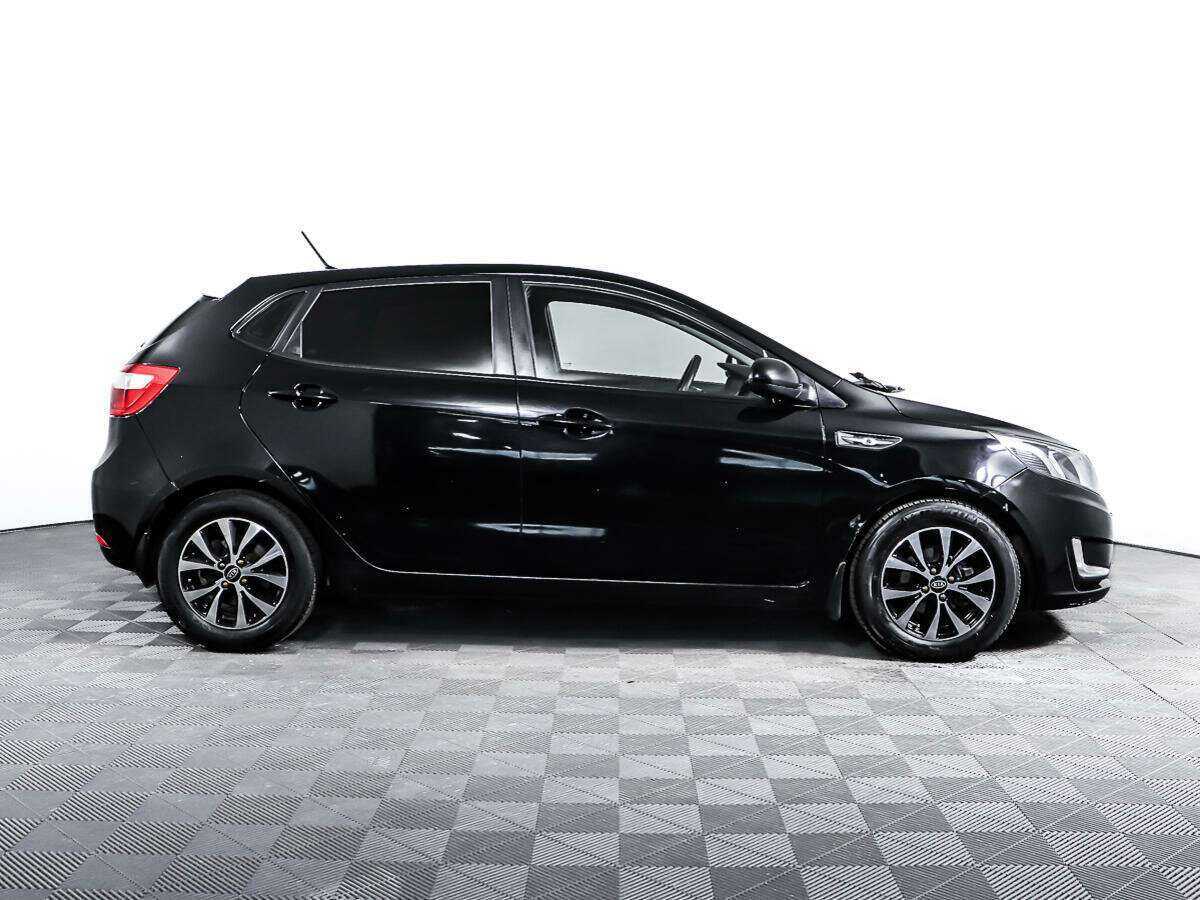 Kia Rio с пробегом — 2013 год. Фото: #3