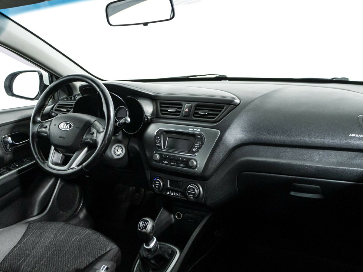 Kia Rio с пробегом — 2013 год. Фото: #8