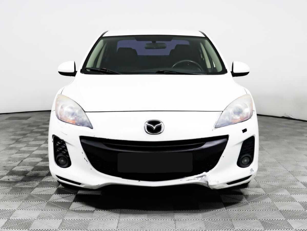 Mazda 3 с пробегом — 2012 год. Фото: #1