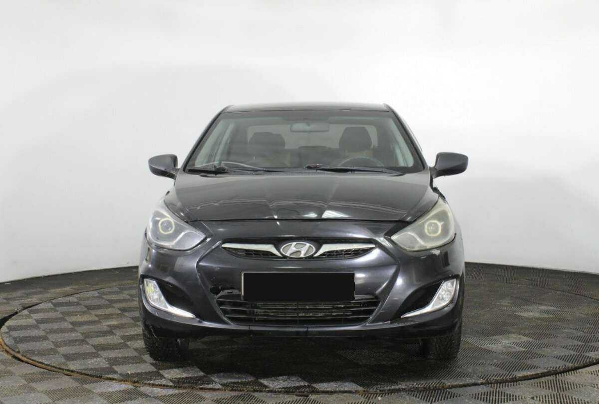 Hyundai Solaris с пробегом — 2013 год. Фото: #1