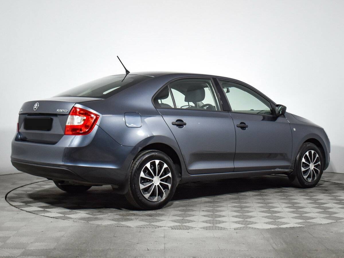 Skoda Rapid с пробегом — 2014 год. Фото: #4