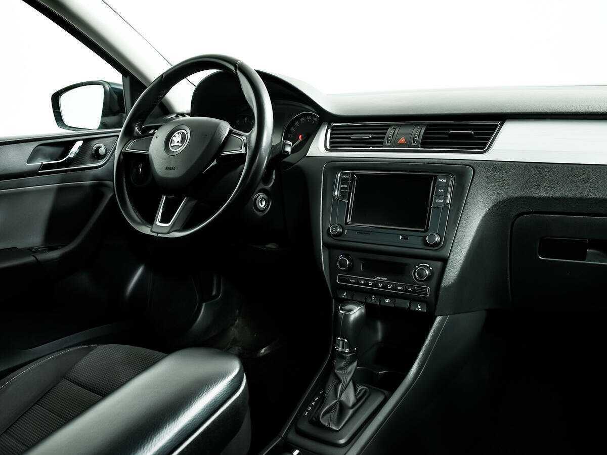 Skoda Rapid с пробегом — 2014 год. Фото: #8