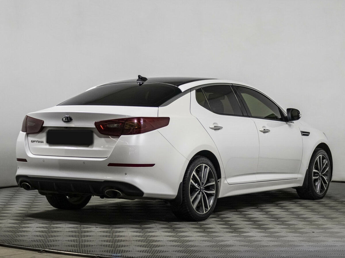 Kia Optima с пробегом — 2013 год. Фото: #4