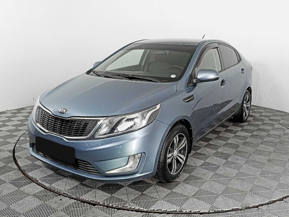 Kia Rio с пробегом — 2013 год. Фото: #0