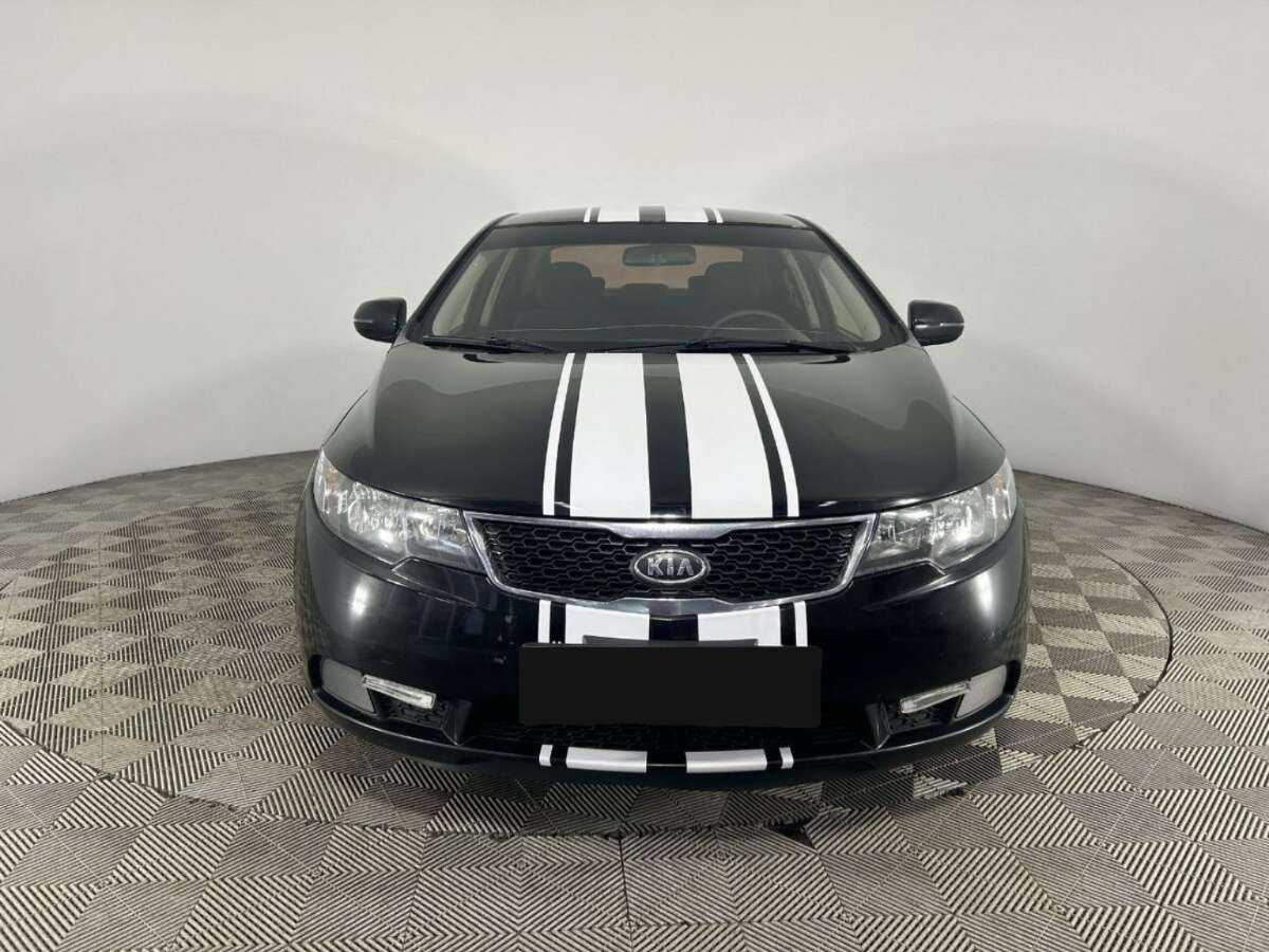 Kia Cerato с пробегом — 2013 год. Фото: #1