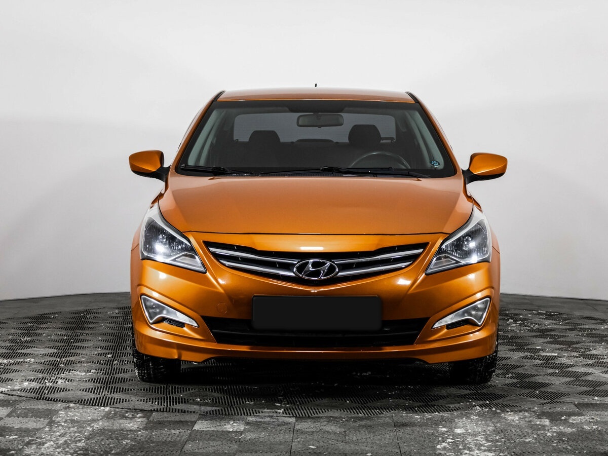 Hyundai Solaris с пробегом — 2014 год. Фото: #1