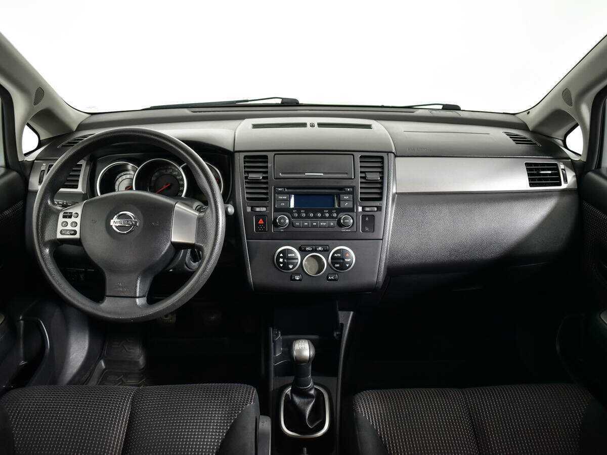 Nissan Tiida с пробегом — 2013 год. Фото: #11