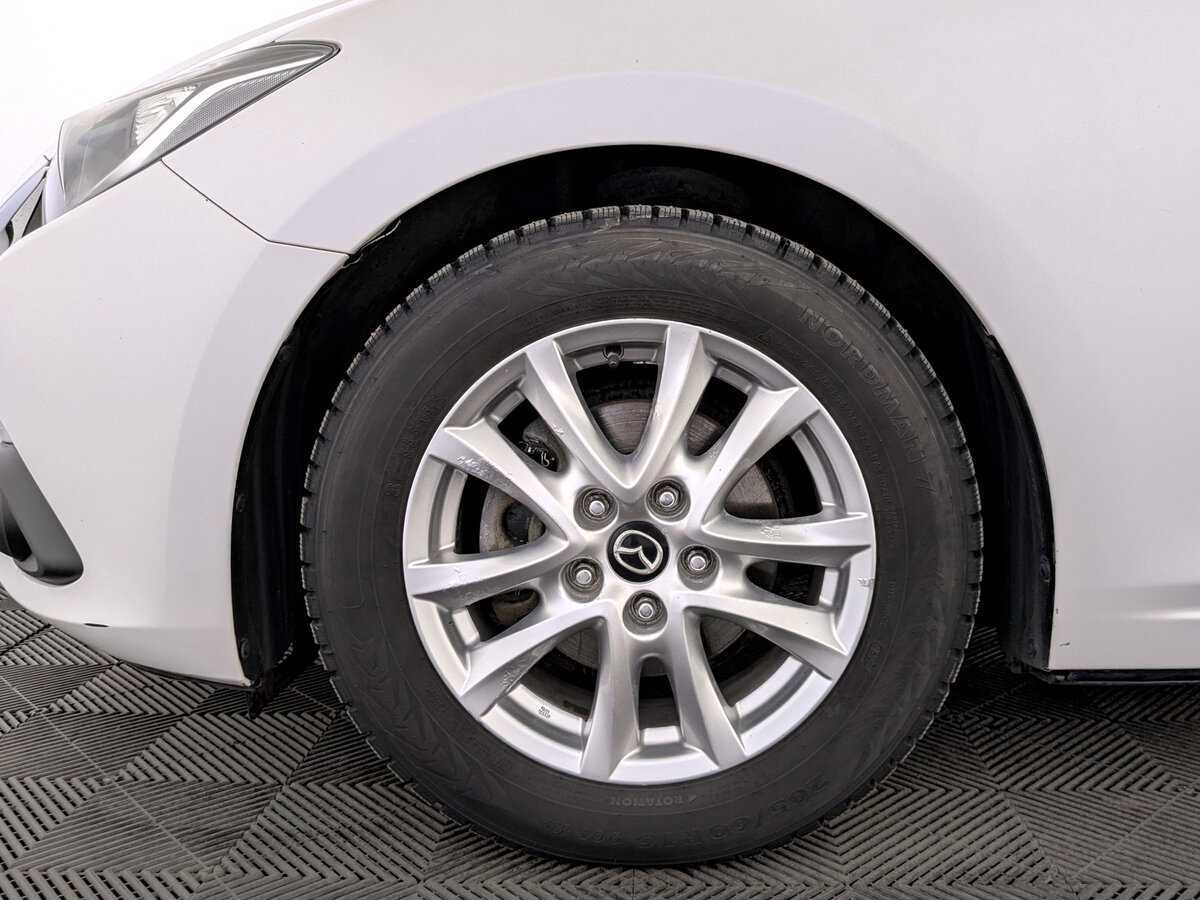 Mazda 3 с пробегом — 2015 год. Фото: #17