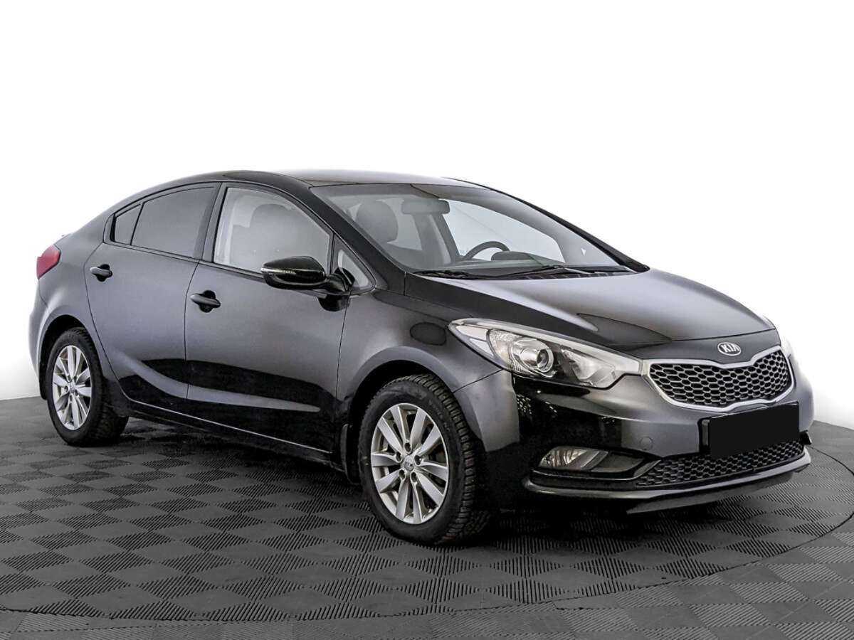 Kia Cerato с пробегом — 2015 год. Фото: #2