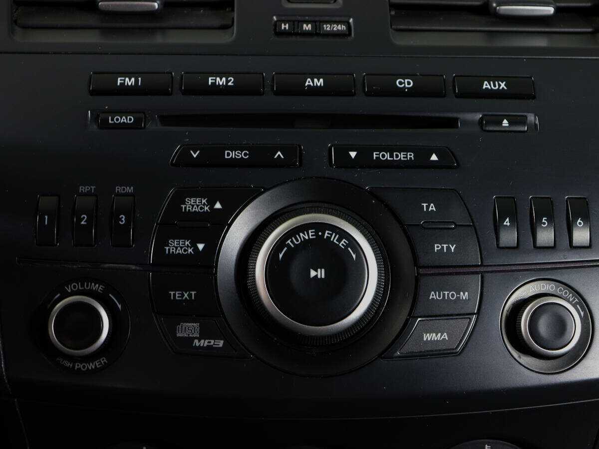 Mazda 3 с пробегом — 2012 год. Фото: #17