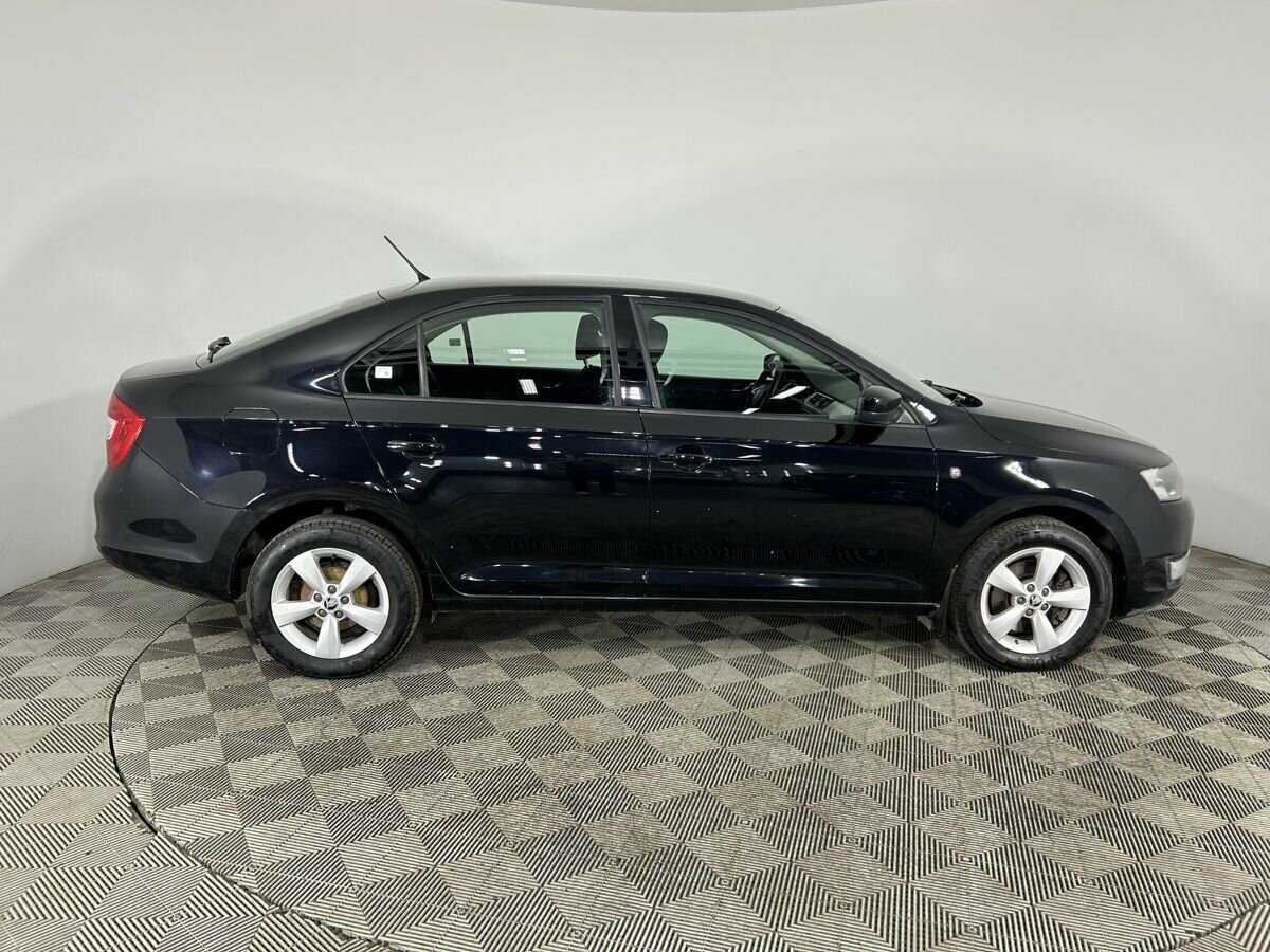 Skoda Rapid с пробегом — 2014 год. Фото: #3