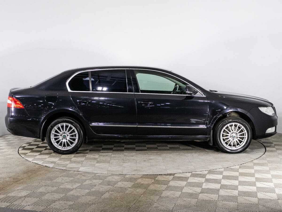 Skoda Superb с пробегом — 2012 год. Фото: #3