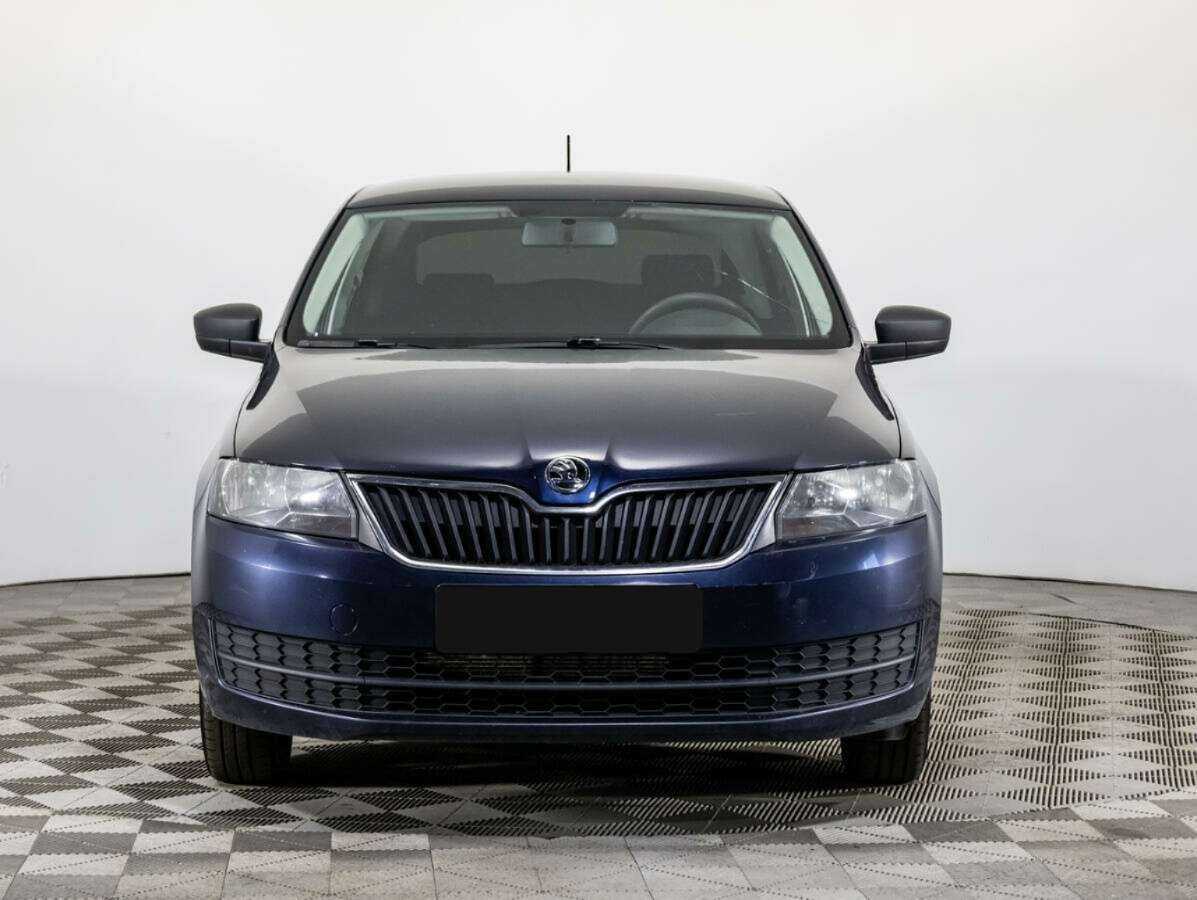 Skoda Rapid с пробегом — 2015 год. Фото: #1