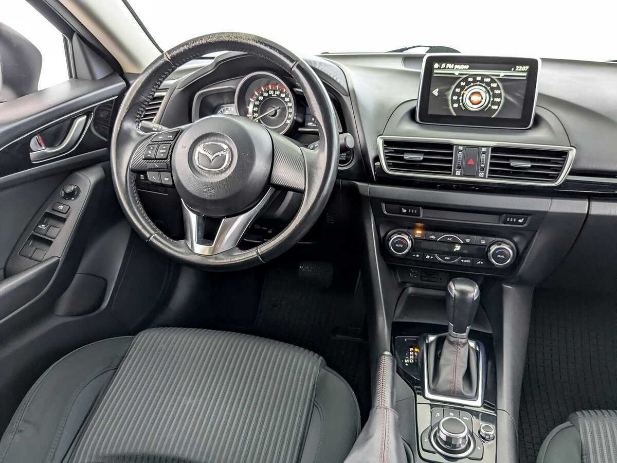 Mazda 3 с пробегом — 2015 год. Фото: #25