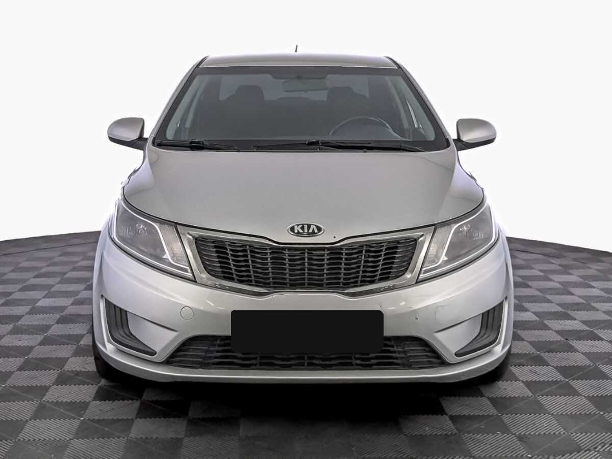 Kia Rio с пробегом — 2014 год. Фото: #1