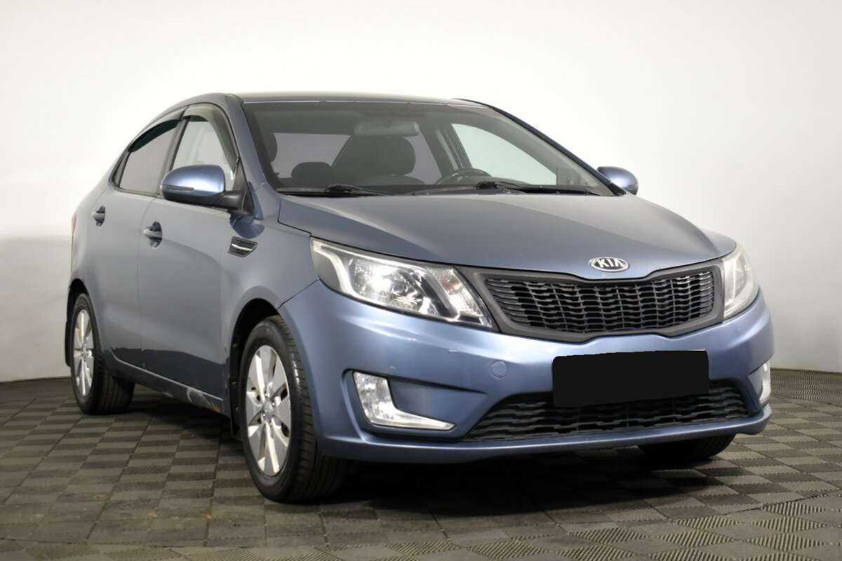 Kia Rio с пробегом — 2013 год. Фото: #2